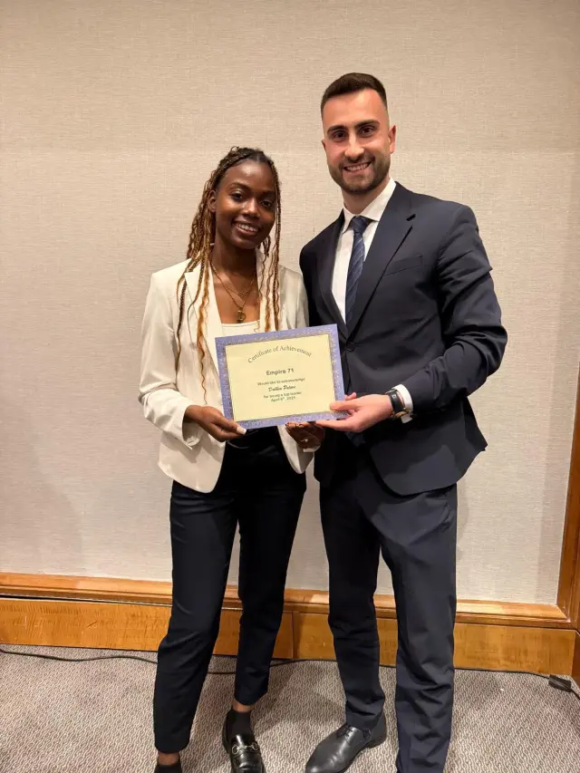 FollowUS team member celebrating success